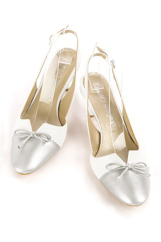 Light silver and pure white women's open back shoes, with a knot. Round toe. Medium spool heels. Top view - Florence KOOIJMAN